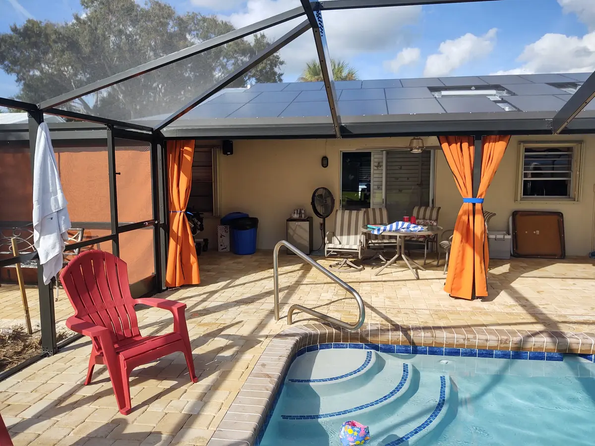 Orange curtains for pool privacy