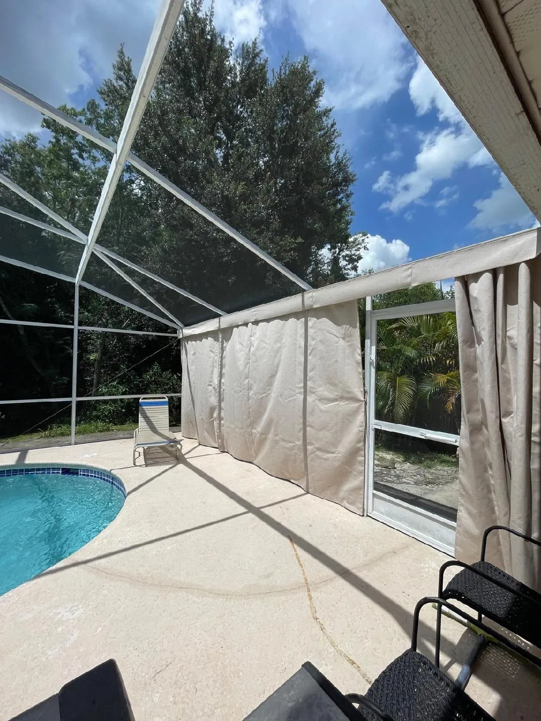 Privacy curtains around pool area