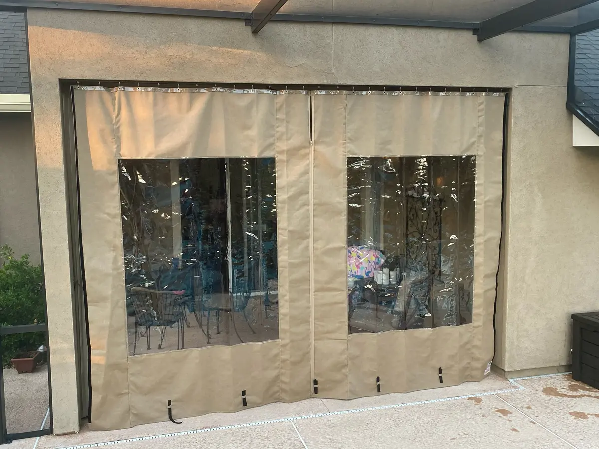 Marine-grade vinyl window curtains fully closed for weather protection in Florida