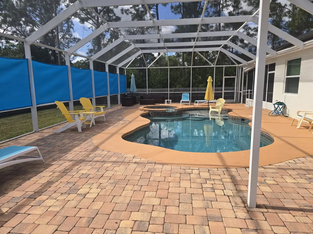 Full coverage privacy panels for complete Florida pool cage enclosure